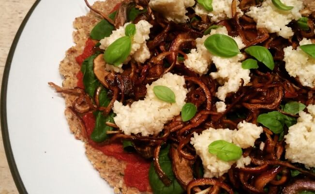 Caramelised Onion & Spinach Pizza With Macadamia ‘Cheese’